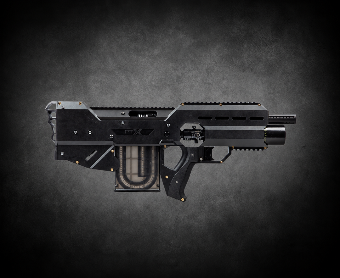 SARX Compact bullpup paintball marker in side profile against a charcoal-gray vignette background